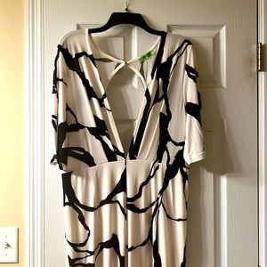 Fun one piece jumpsuit. Deep V. Backless fits like 1X. Runs small.